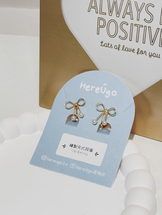 韓製。金線蝴蝶結小珍珠夾式耳環